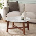 Table basse ronde avec plateau en céramique, blanc cassé