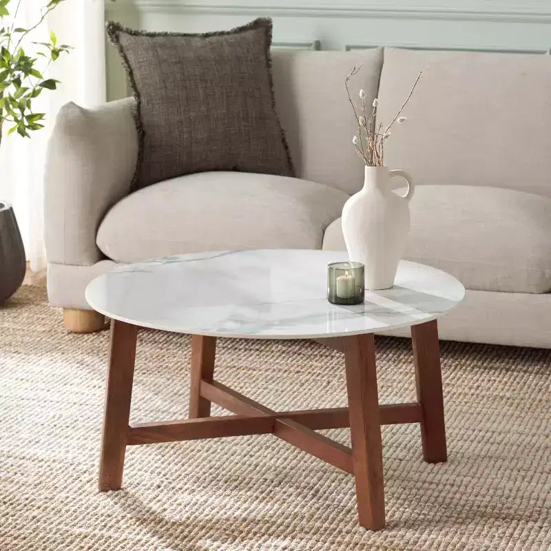 Table basse ronde avec plateau en céramique, blanc cassé